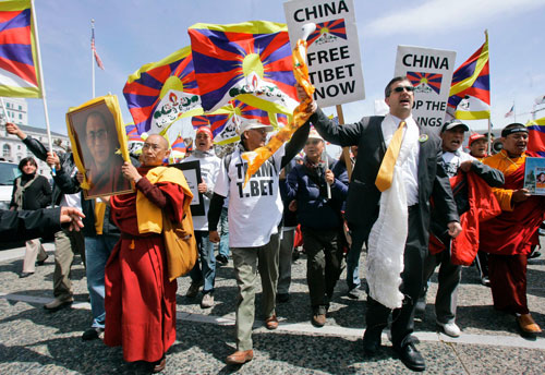 Demonstrators marching in support of Tibet